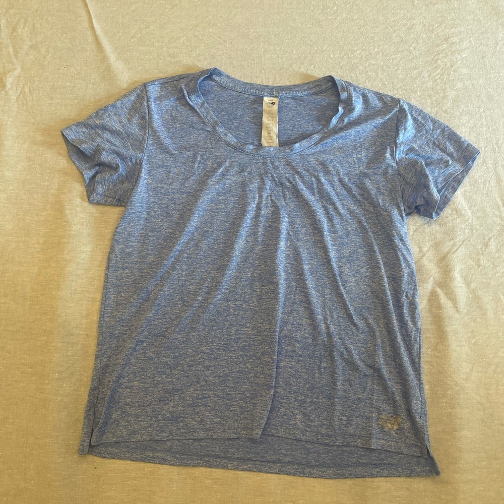 Women’s New Balance athletic t-shirt, size 8.
